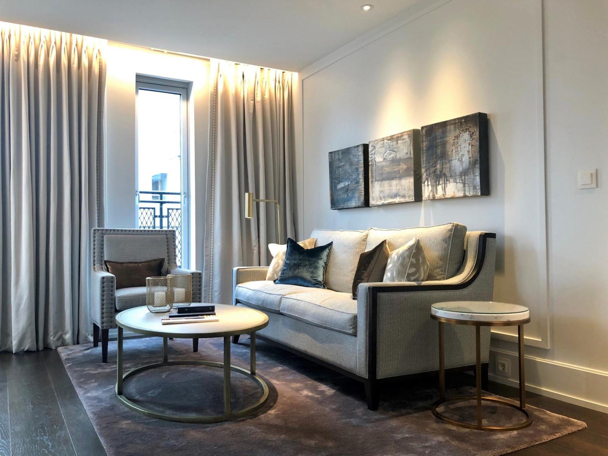Hotel Continental Oslo Luaran gambar A living room in a serviced apartment in London